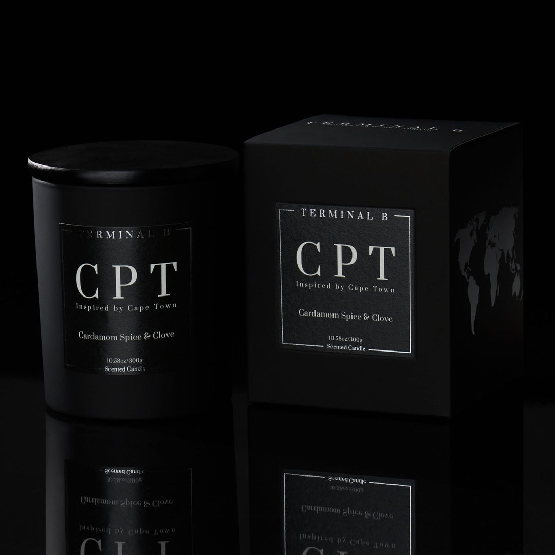 CPT luxury candle by Terminal B in Cardamom Spice & Clove fragrance, displayed against a black background. Inspired by Cape Town, carefully designed for an elegant, long-lasting scent.