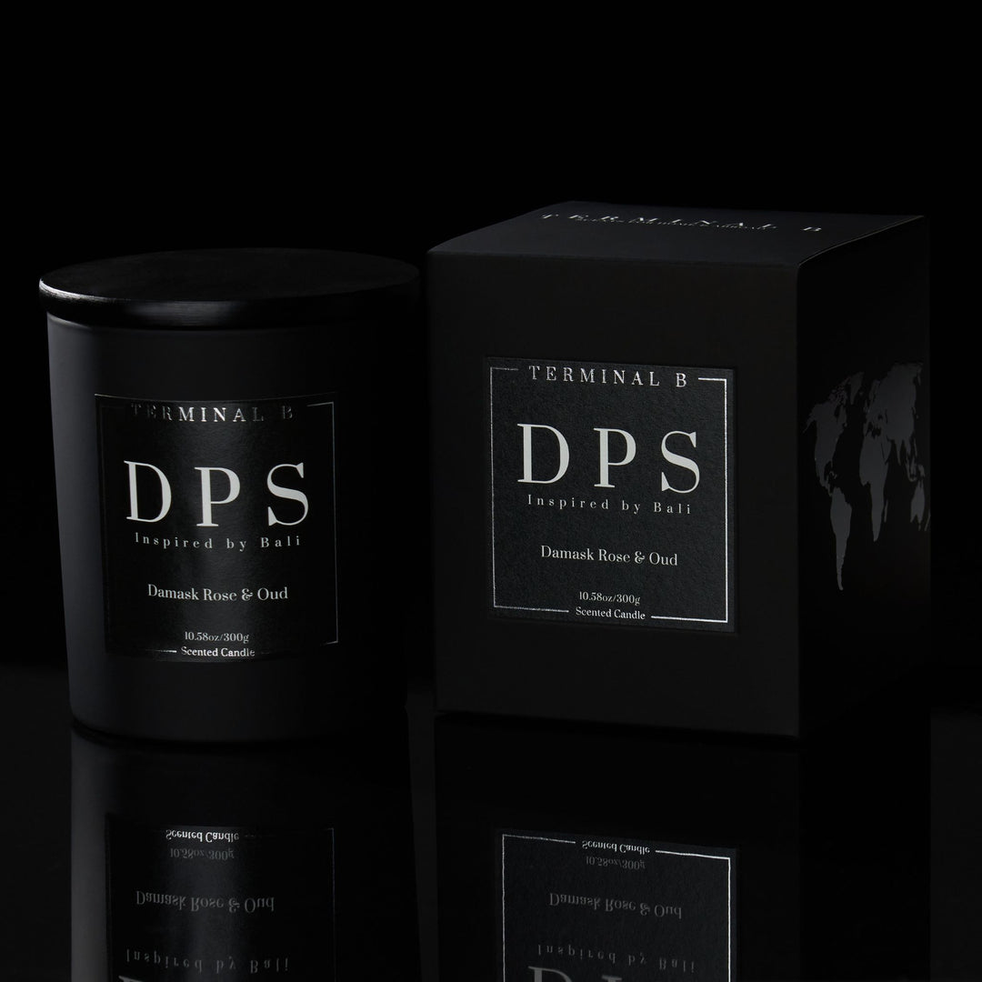 DPS luxury candle by Terminal B in Damask Rose & Oud fragrance, displayed against a black background. Inspired by Bali, carefully designed for an elegant, long-lasting scent.