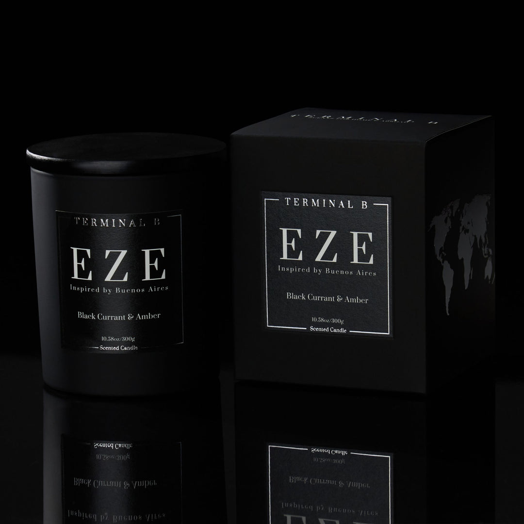 EZE luxury candle by Terminal B in Black Currant & Amber fragrance, displayed against a black background. Inspired by Buenos Aires, carefully designed for an elegant, long-lasting scent.