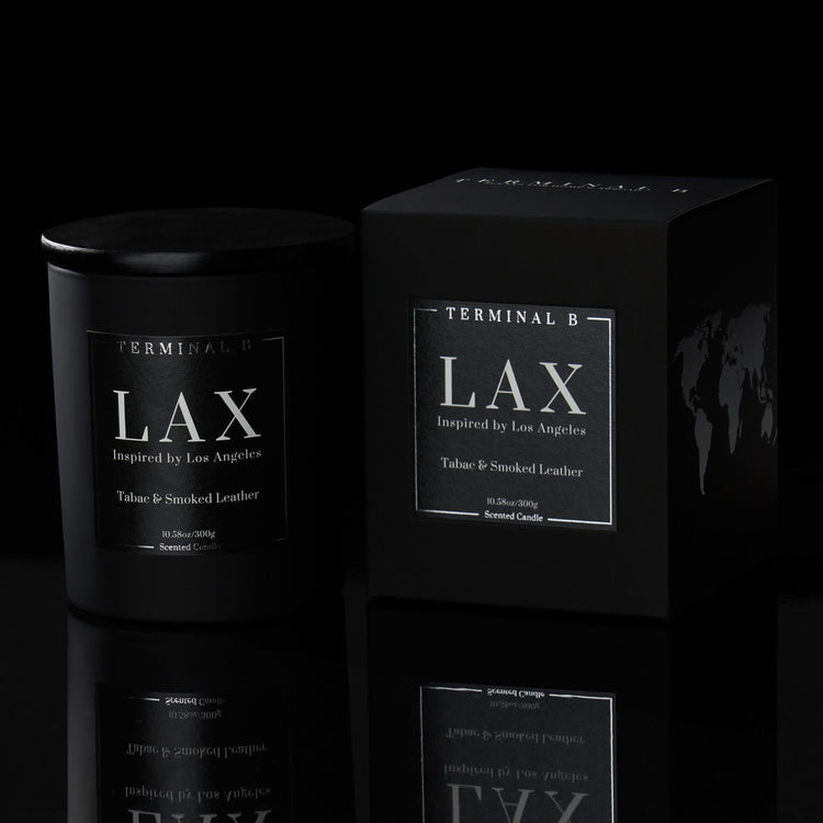 LAX luxury candle by Terminal B in Tabac & Smoked Leather fragrance, displayed against a black background. Inspired by Los Angeles, carefully designed for an elegant, long-lasting scent.