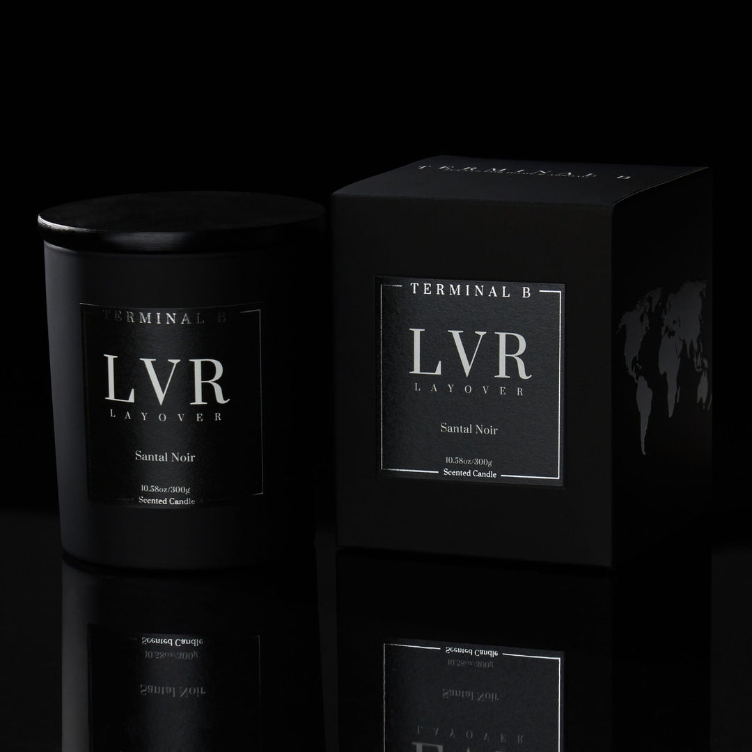 LVR luxury candle by Terminal B in Santal Noir fragrance, displayed against a black background. Inspired by Layover, carefully designed for an elegant, long-lasting scent.