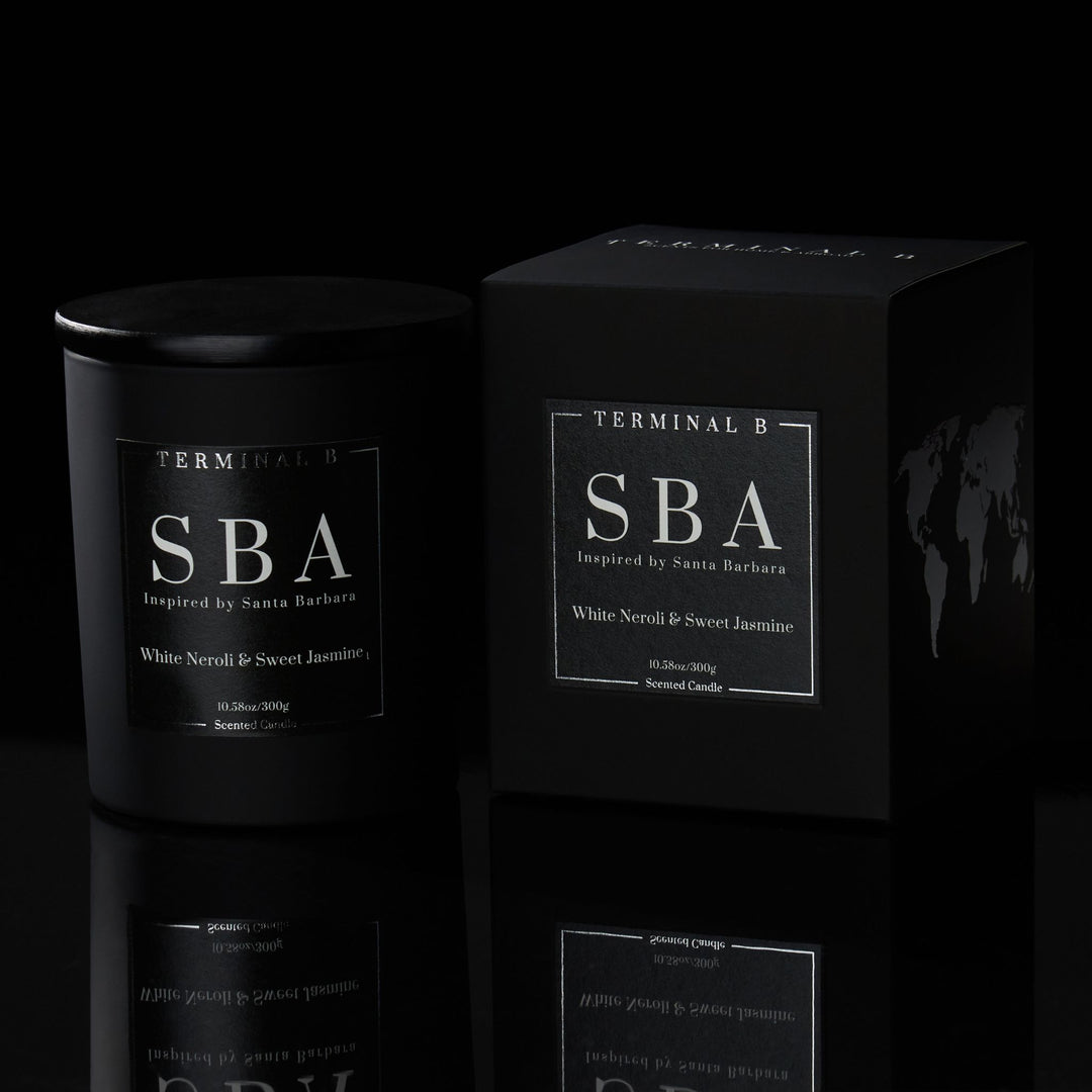 SBA luxury candle by Terminal B in White Neroli & Sweet Jasmine fragrance, displayed against a black background. Inspired by Santa Barbara, carefully designed for an elegant, long-lasting scent.