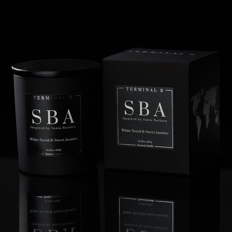 SBA luxury candle by Terminal B in White Neroli & Sweet Jasmine fragrance, displayed against a black background. Inspired by Santa Barbara, carefully designed for an elegant, long-lasting scent.