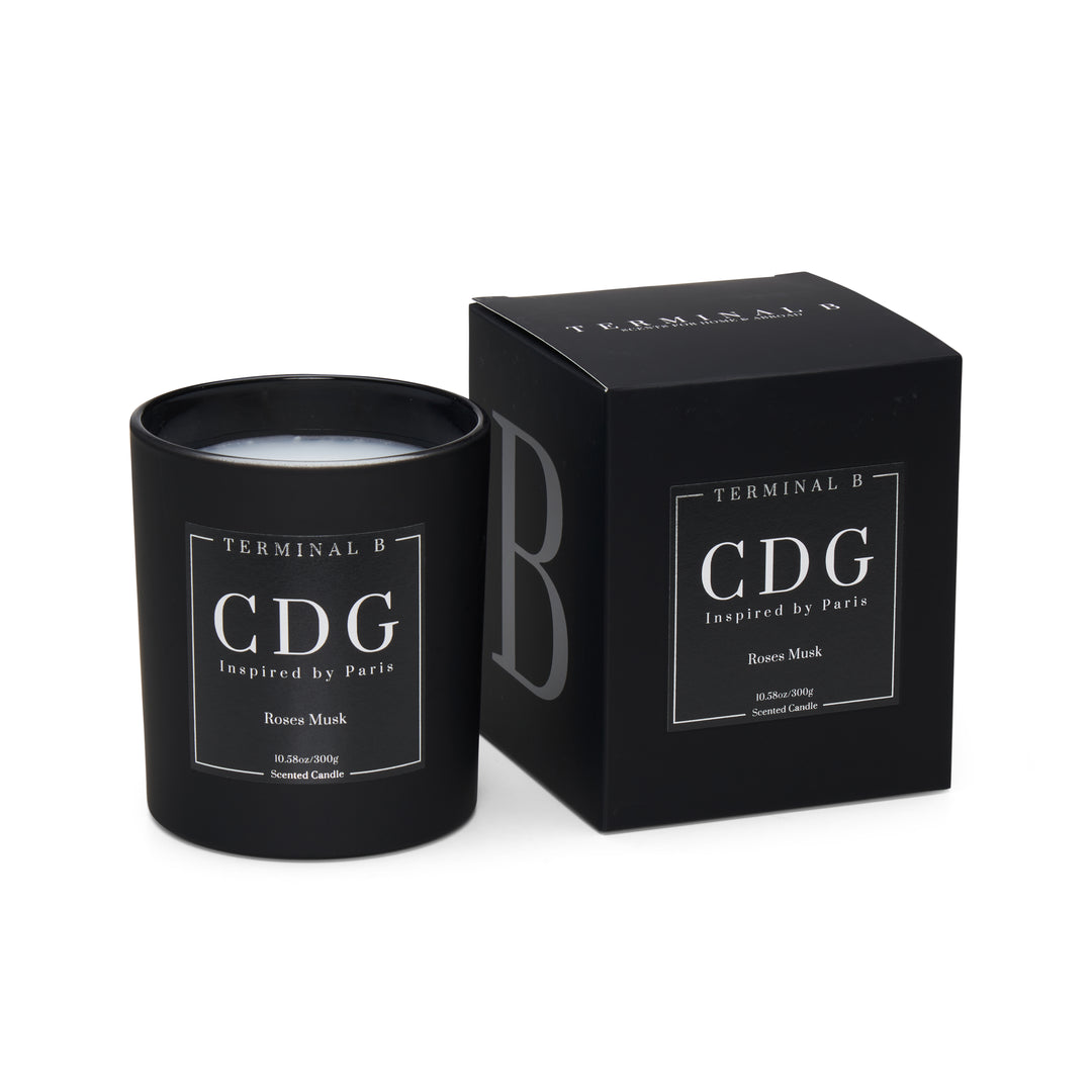 CDG luxury candle by Terminal B in Roses Musk fragrance, displayed against a white background. Inspired by Paris, carefully designed for an elegant, long-lasting scent.