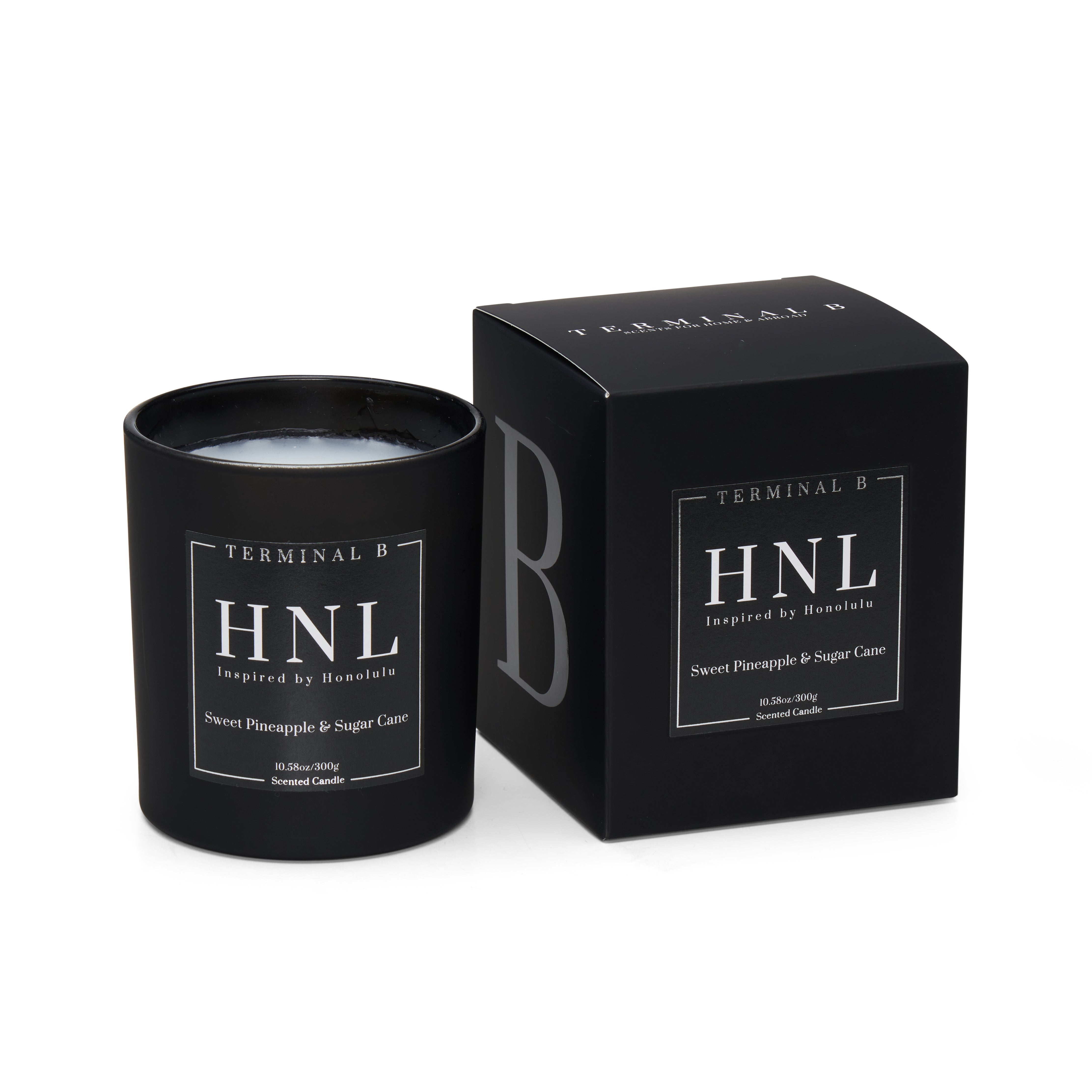 HNL luxury candle by Terminal B in Sweet Pineapple & Sugar Cane fragrance, displayed against a white background. Inspired by Honolulu, carefully designed for an elegant, long-lasting scent.